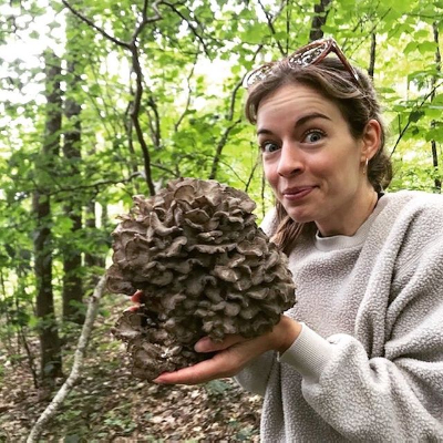 Photo of Anni Krueger holding Hen-of-the-wood